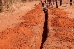 Digging ditch for new water pipes in Betroka